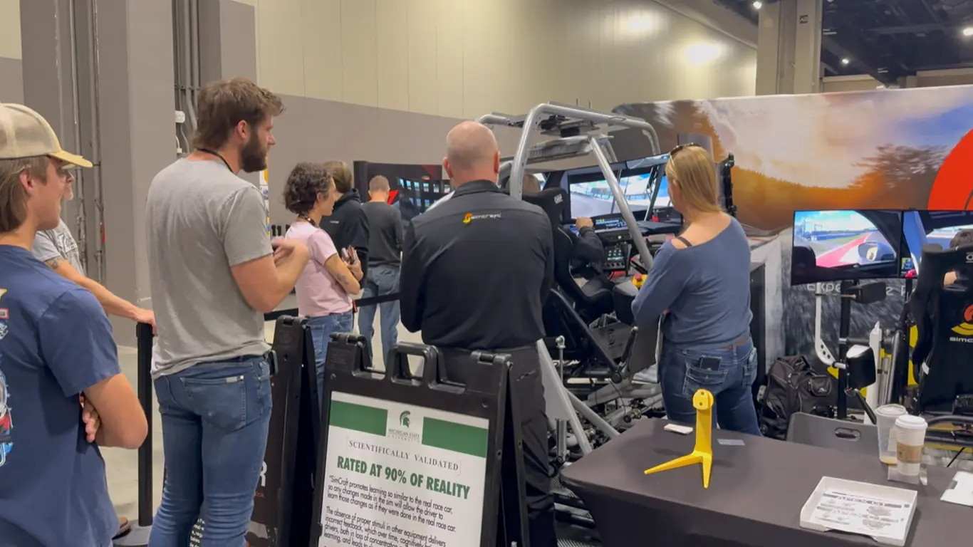 The SimCraft booth from the SimRacing Expo 2026 featuring Skip Barber and our APEX 6 GT, APEX 4 CT and the GRID1 racing simulators